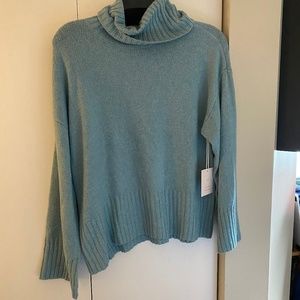 light blue turtleneck sweater